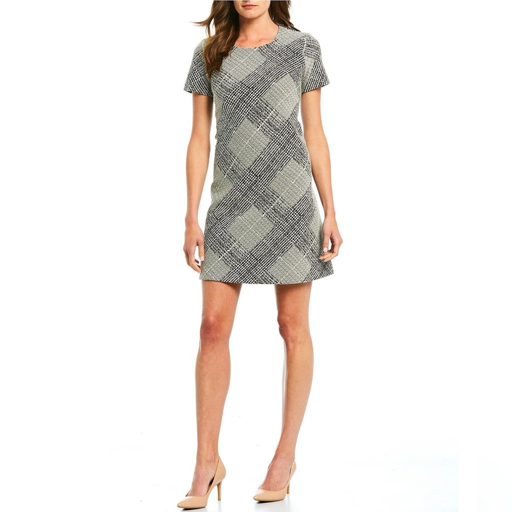Size 4 gently used plaid black & white Calvin Klein Short Sleeve Shift Dress
